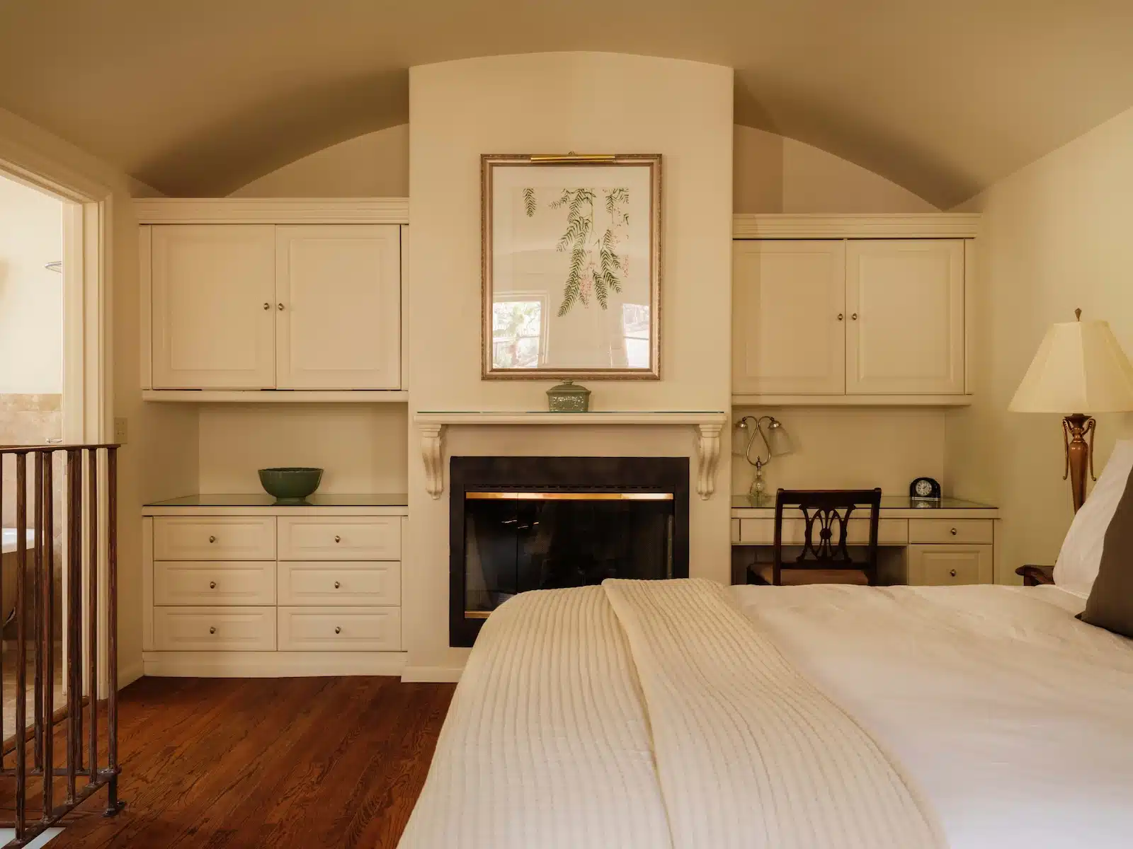 Loft bed with fireplace, built in desk and dresser