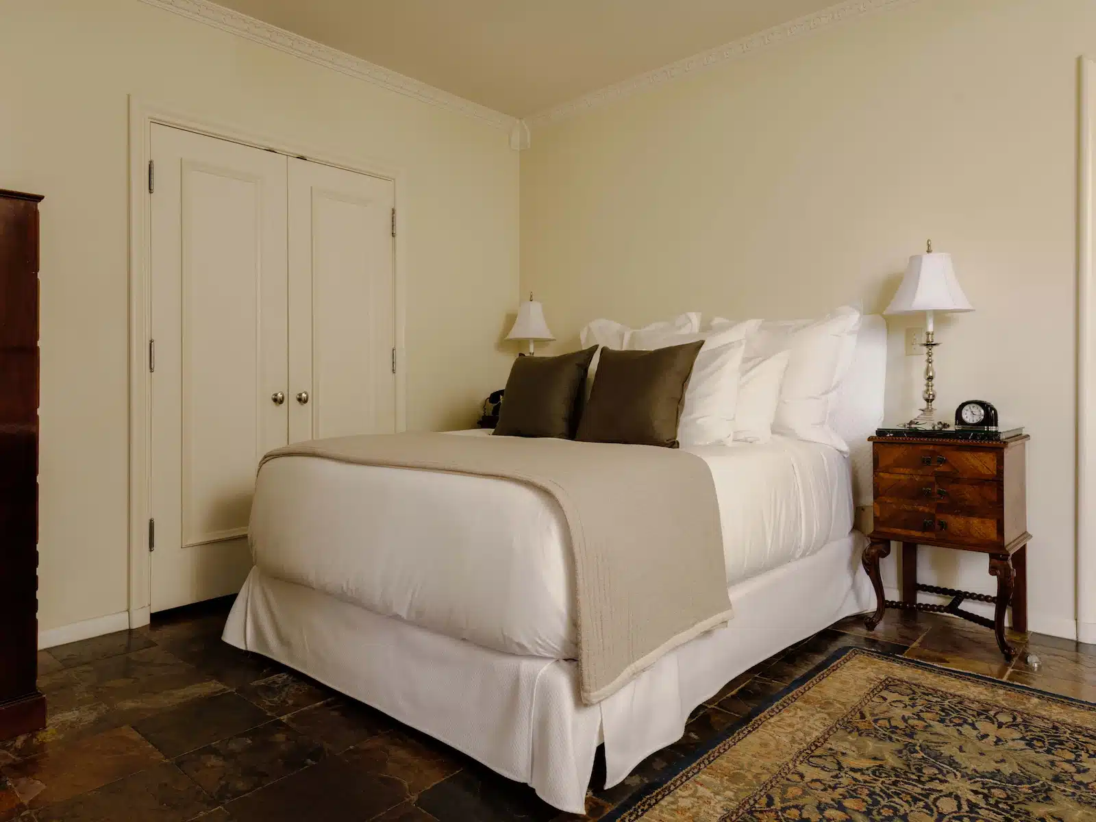 Palm bed and side table with lamp