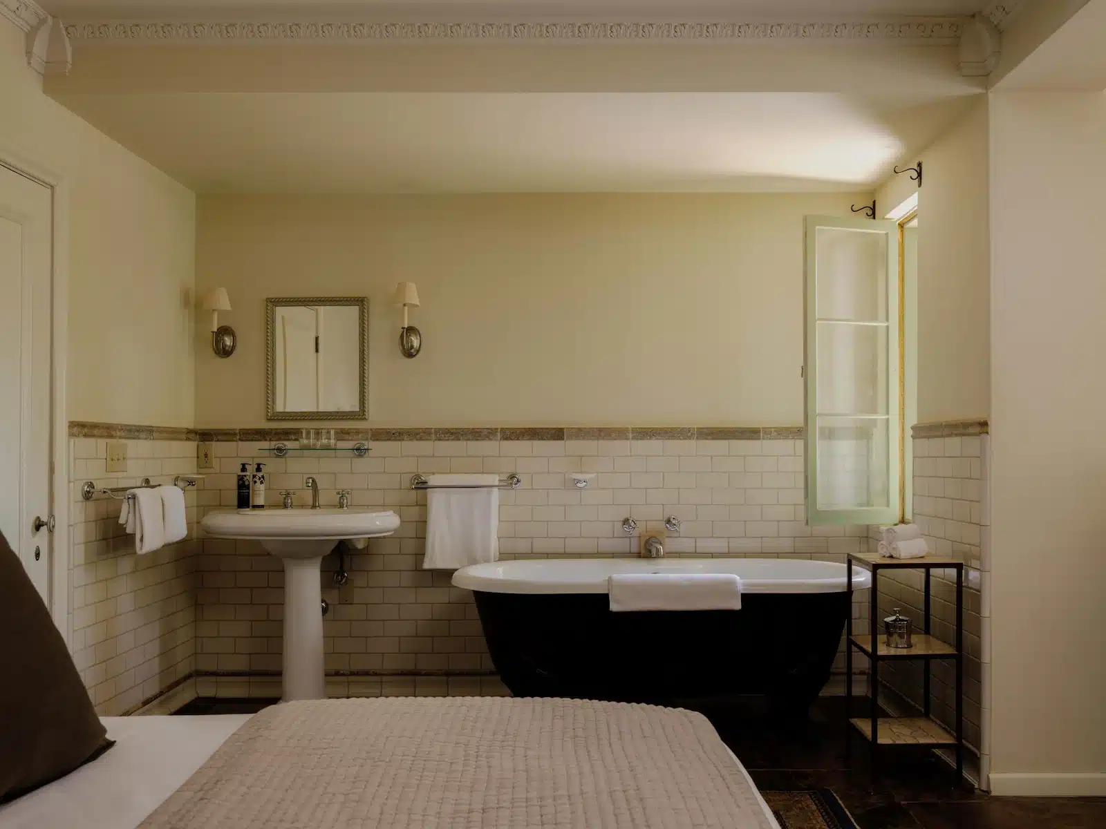 Palm bed with free standing tub and sink